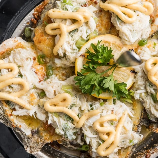 Gambino's Charbroiled Oysters with Crabmeat.
