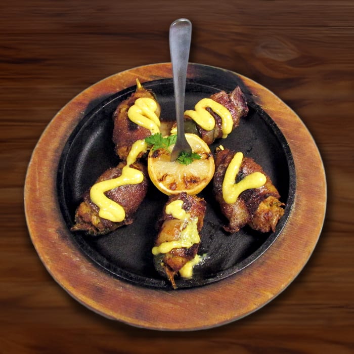 Bacon Wrapped Crab Stuffed Jalapenos.